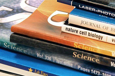 Publications (stack of journals)